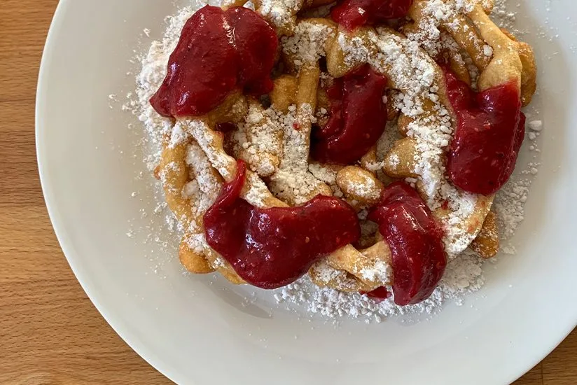 Homemade Funnel Cake with Cranberry Coulis