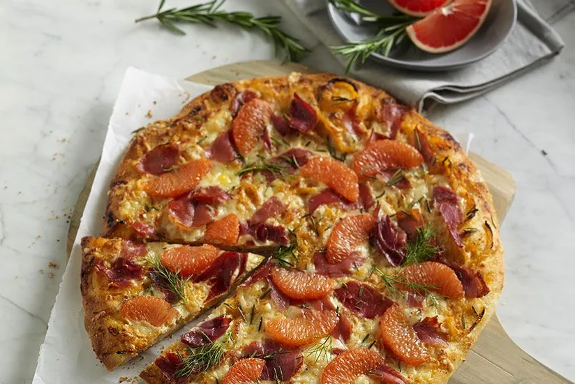 Rosemary Prosciutto Pizza with Spicy Grapefruit Caramelized Fennel and Onion